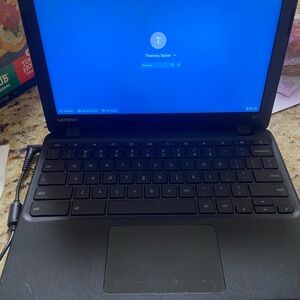 Lenovo Black Laptop with Blue Screen
